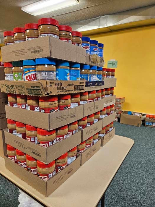 Volunteers Double Student Food Packs Before Holiday Break in Baker County