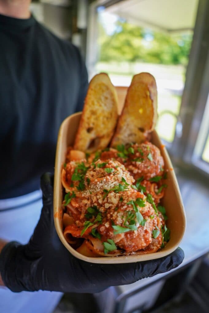 Columbus pasta truck serves fresh bowls inside a Parmigiano wheel