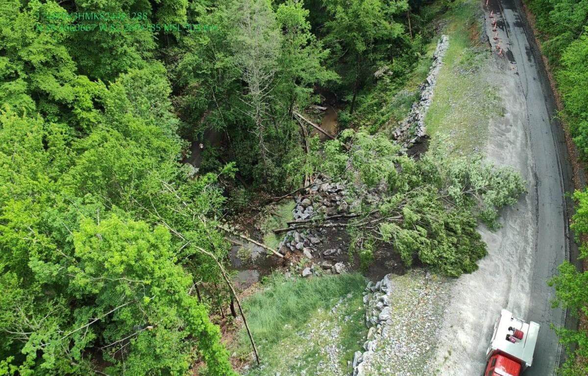 Asheville breaks nearly century-old rainfall record, flooding roads in Buncombe County