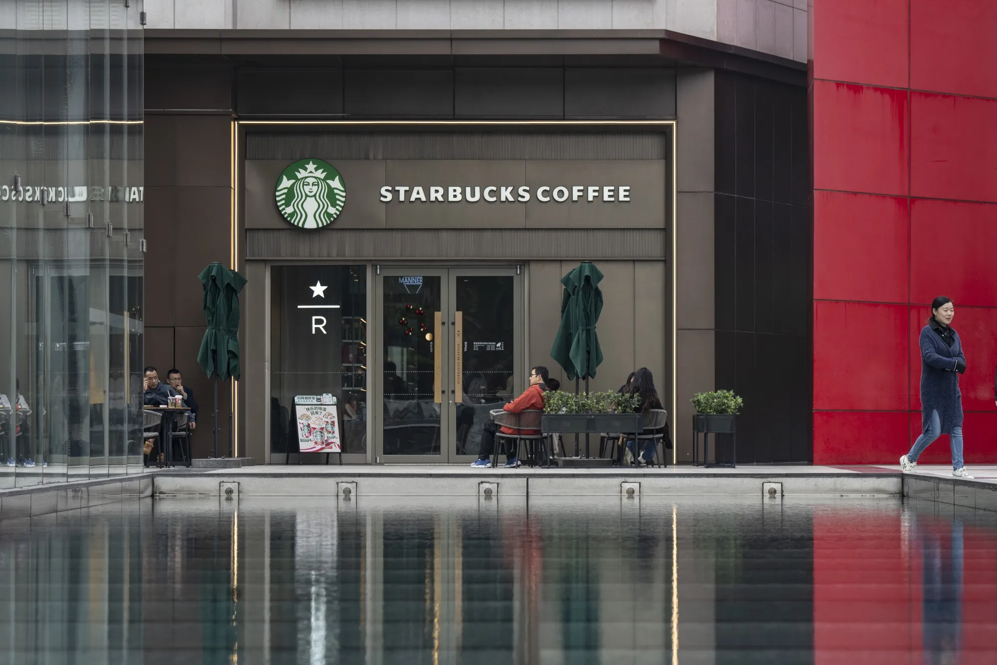 Starbucks cuts corporate roles in London and Hong Kong, shifts control abroad