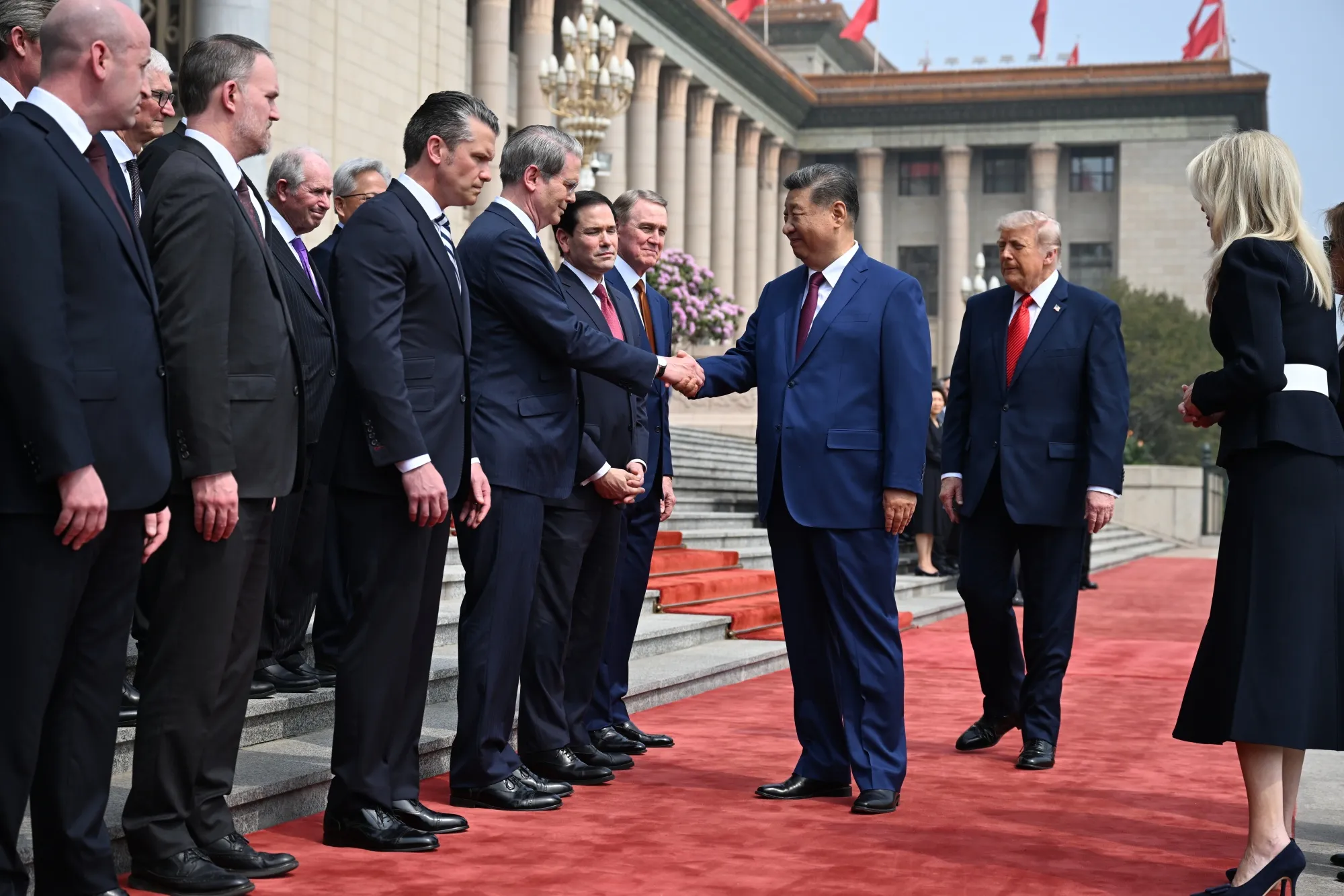 Trump takes top C.E.O.s to Beijing to press China trade deals