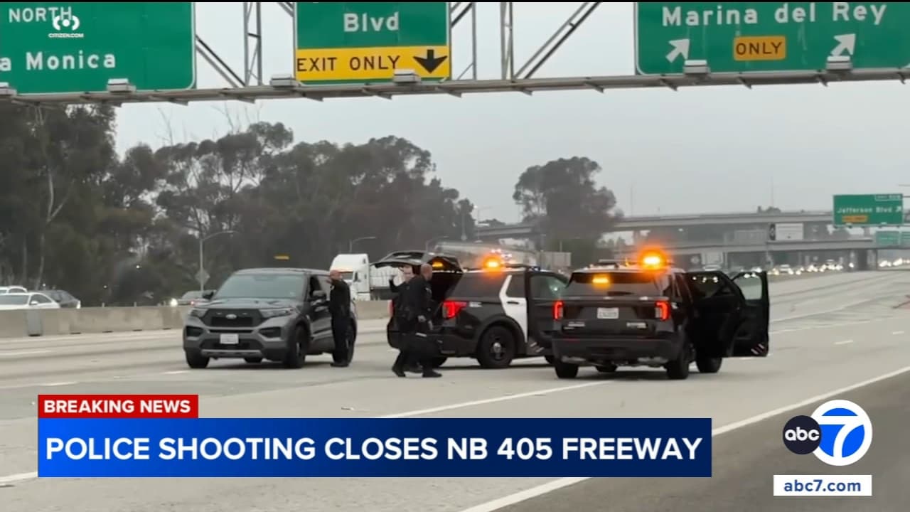 Robbery suspect shot dead on 405, closing freeway for hours