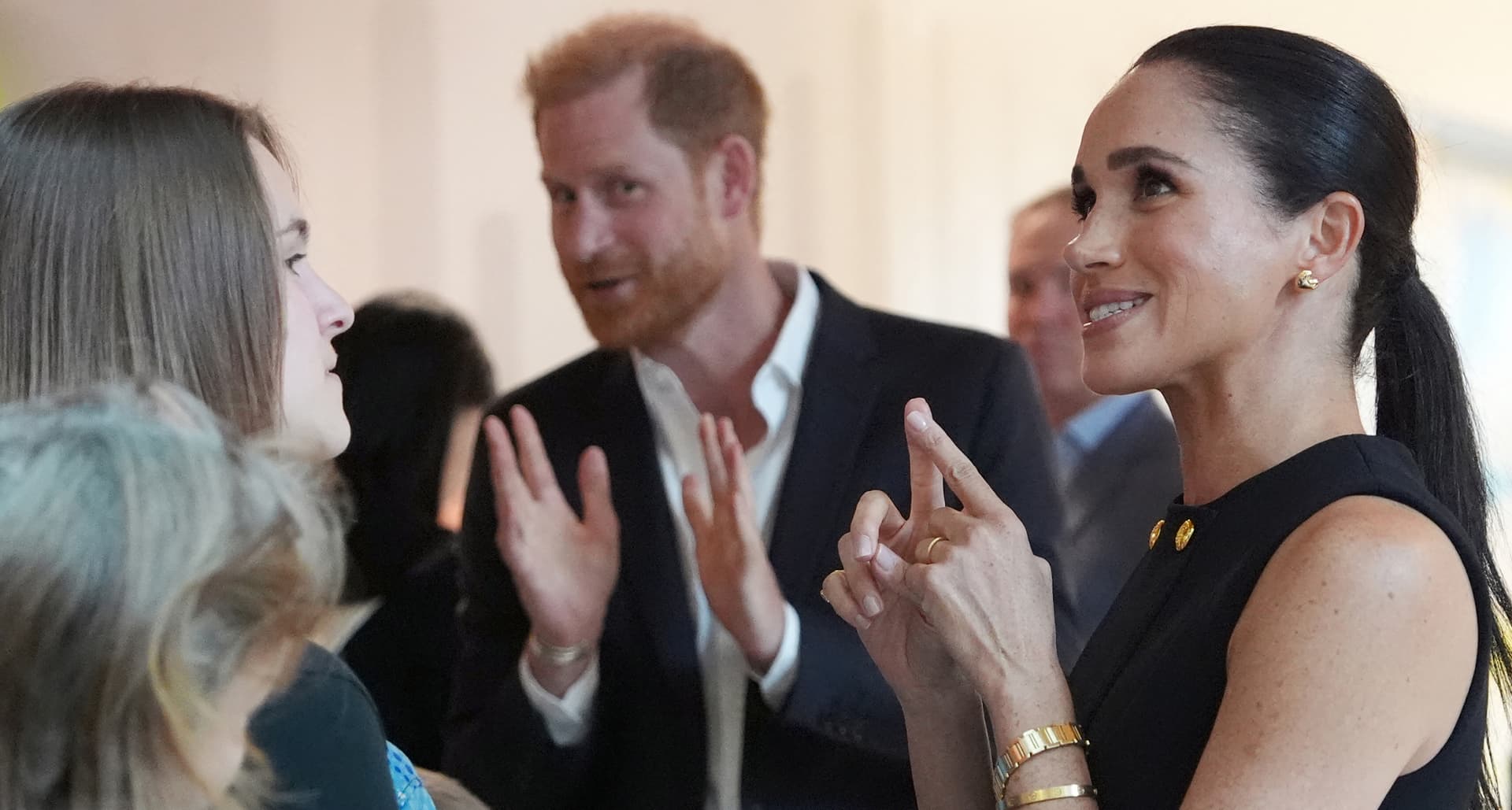 Meghan Markle’s 14k gold heart earrings signal polished diplomatic dressing in Australia
