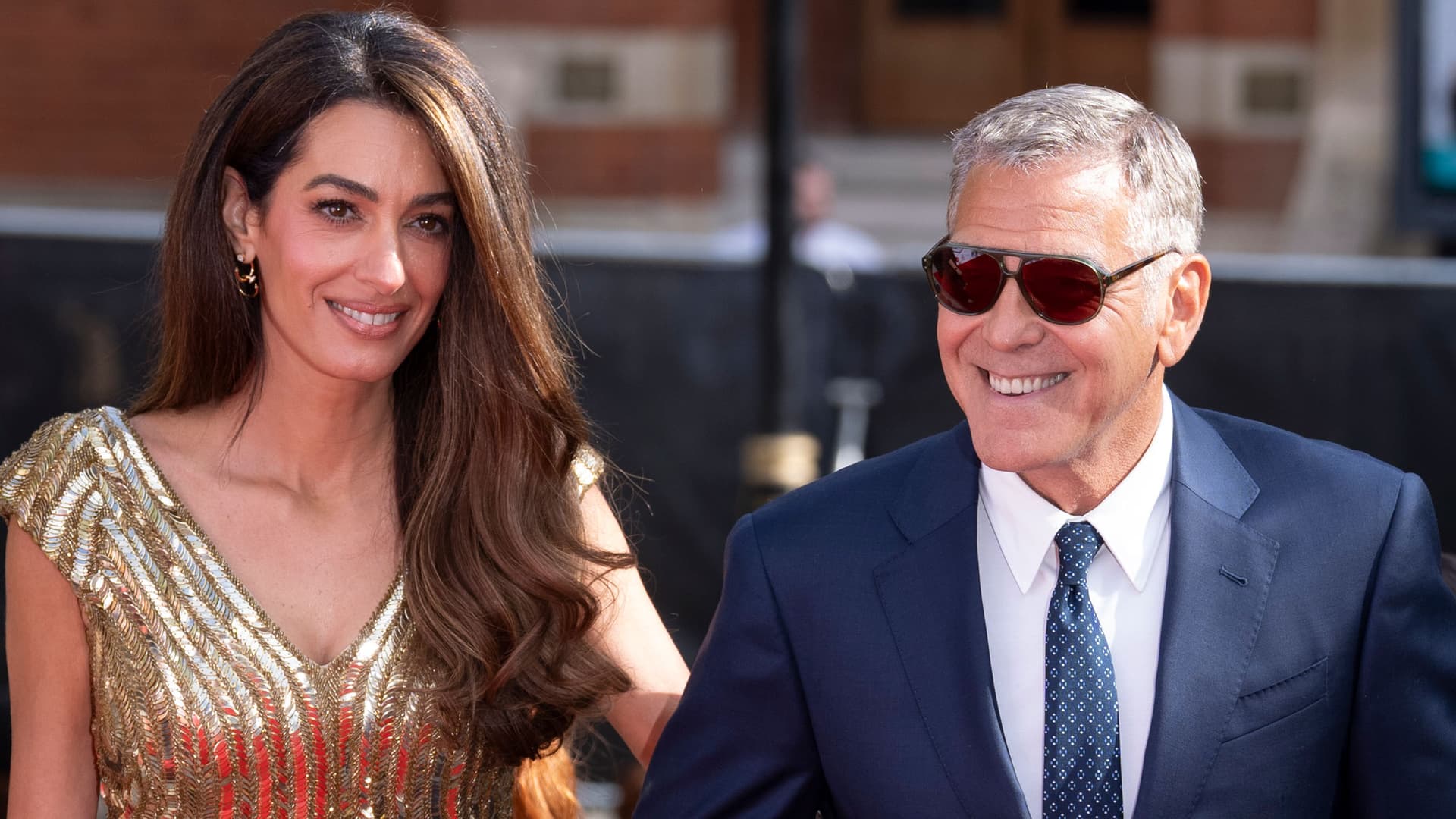 Amal Clooney’s gold sequin gown proves a capsule answer for black-tie weddings