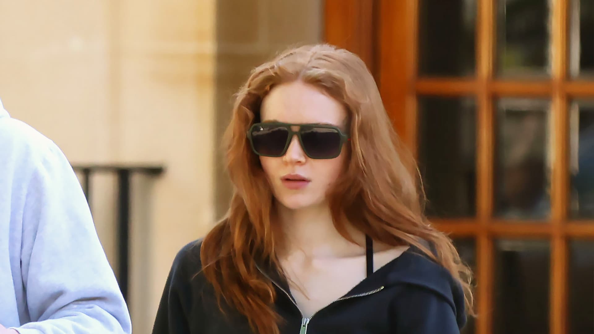 Sadie Sink shows petites how to wear denim Bermuda shorts