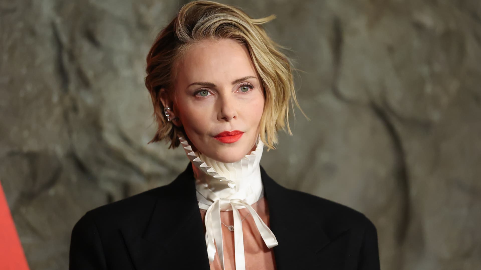 Charlize Theron's Monochrome Press Tour Revives Old Money Minimalism
