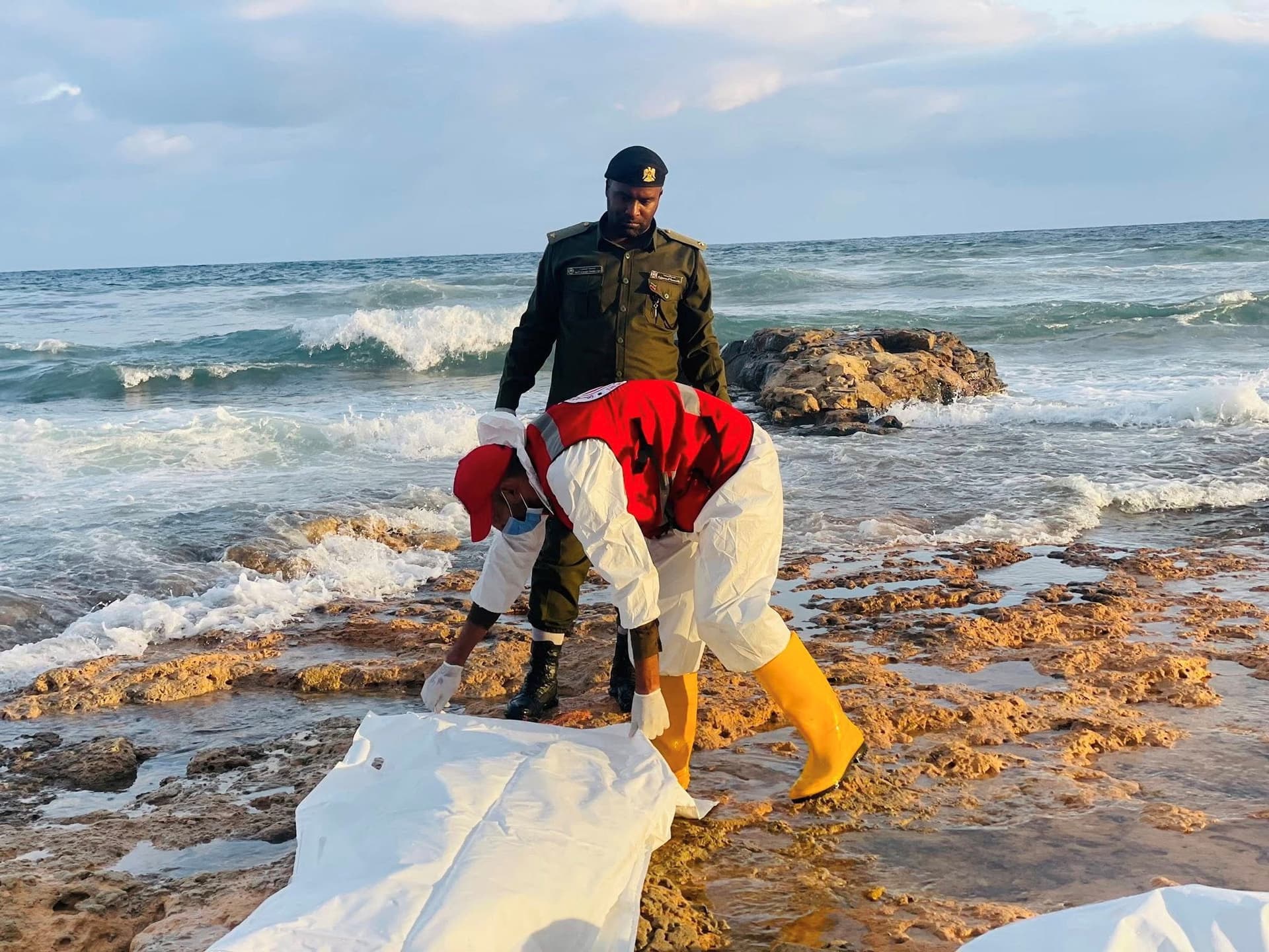 At least 15 migrants found dead after boat capsizes off Libya coast