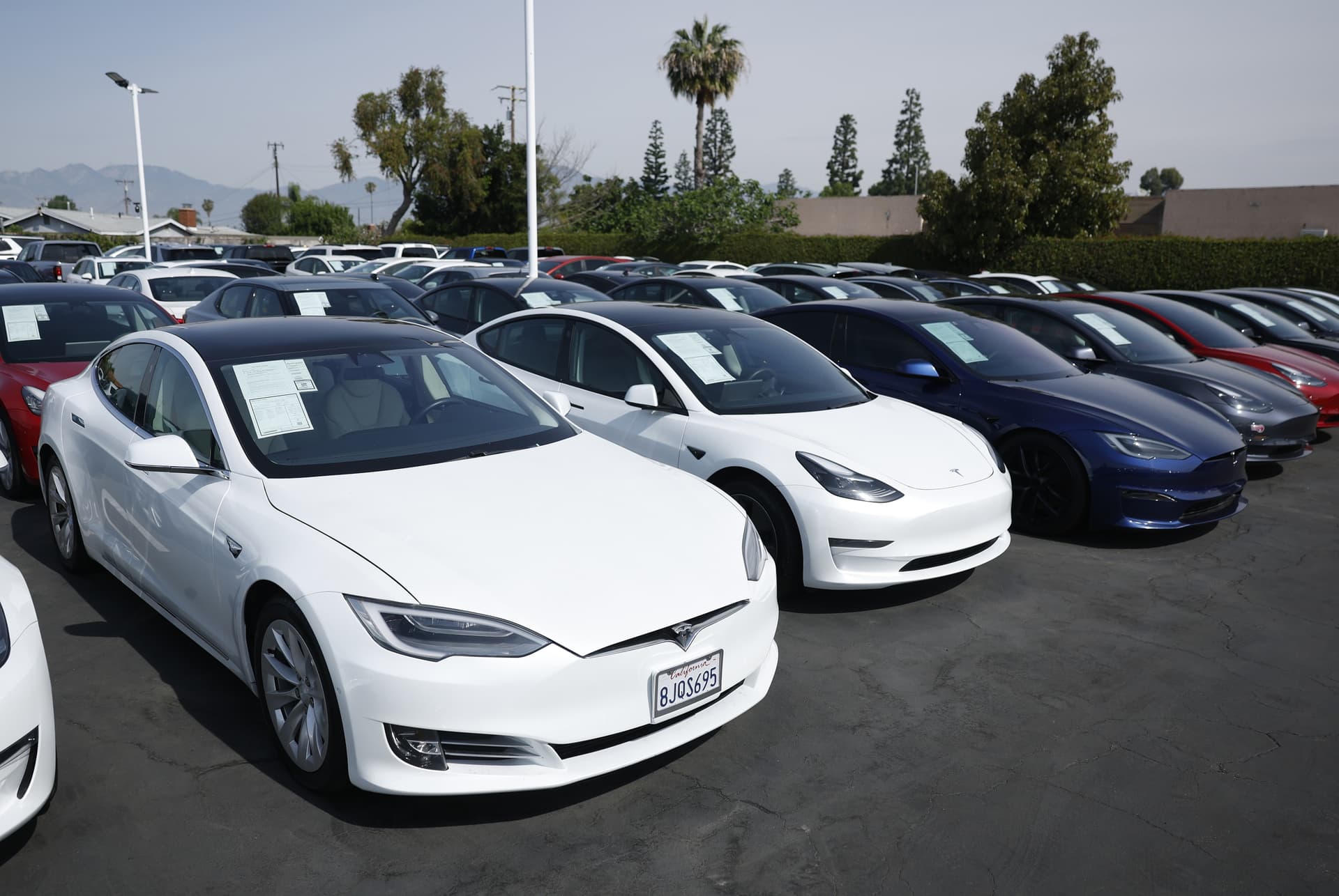 Tesla posts record second-quarter deliveries as shares fall anyway