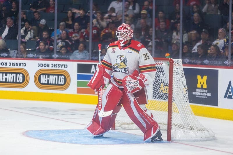 Postava Signs With Detroit, Shines as Red Wings Goaltending Prospect in AHL
