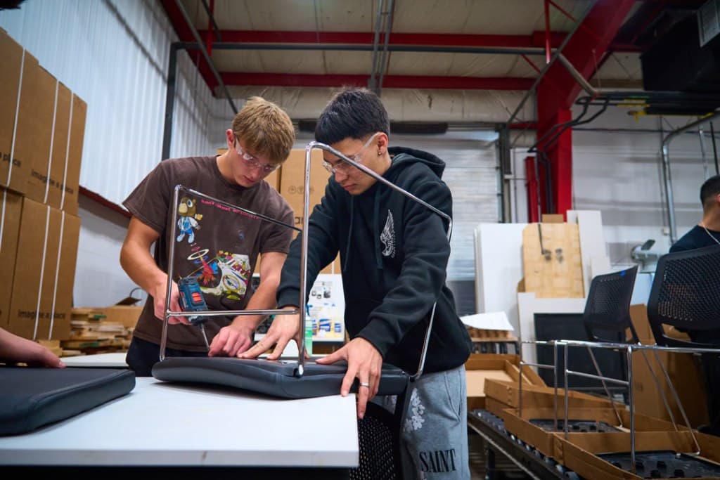 Southridge, OFS celebrate first Crafted class as students build school furniture