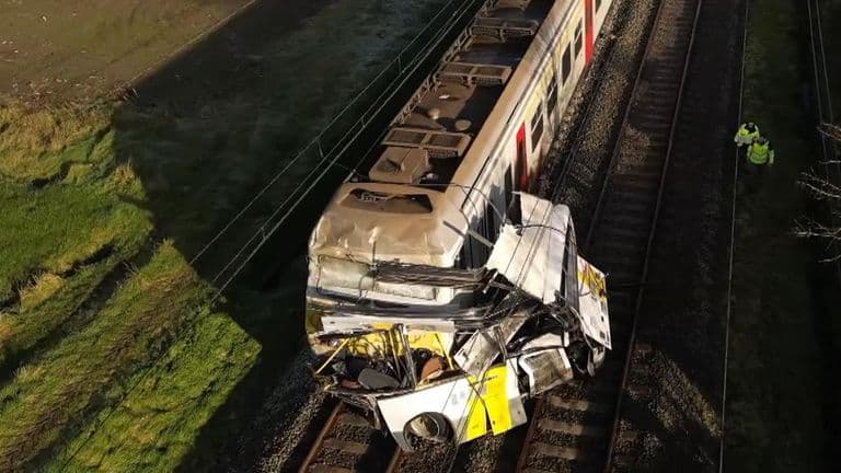 Train crashes into school minibus in Belgium, several dead, injured