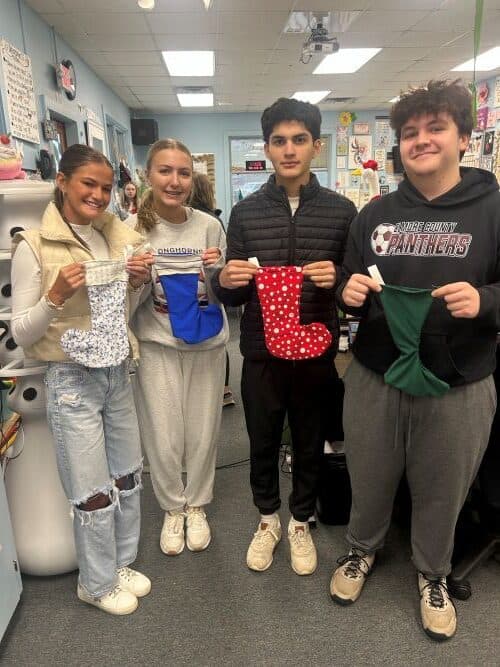 High School Sewing Project Delivers Hundreds of Holiday Stockings