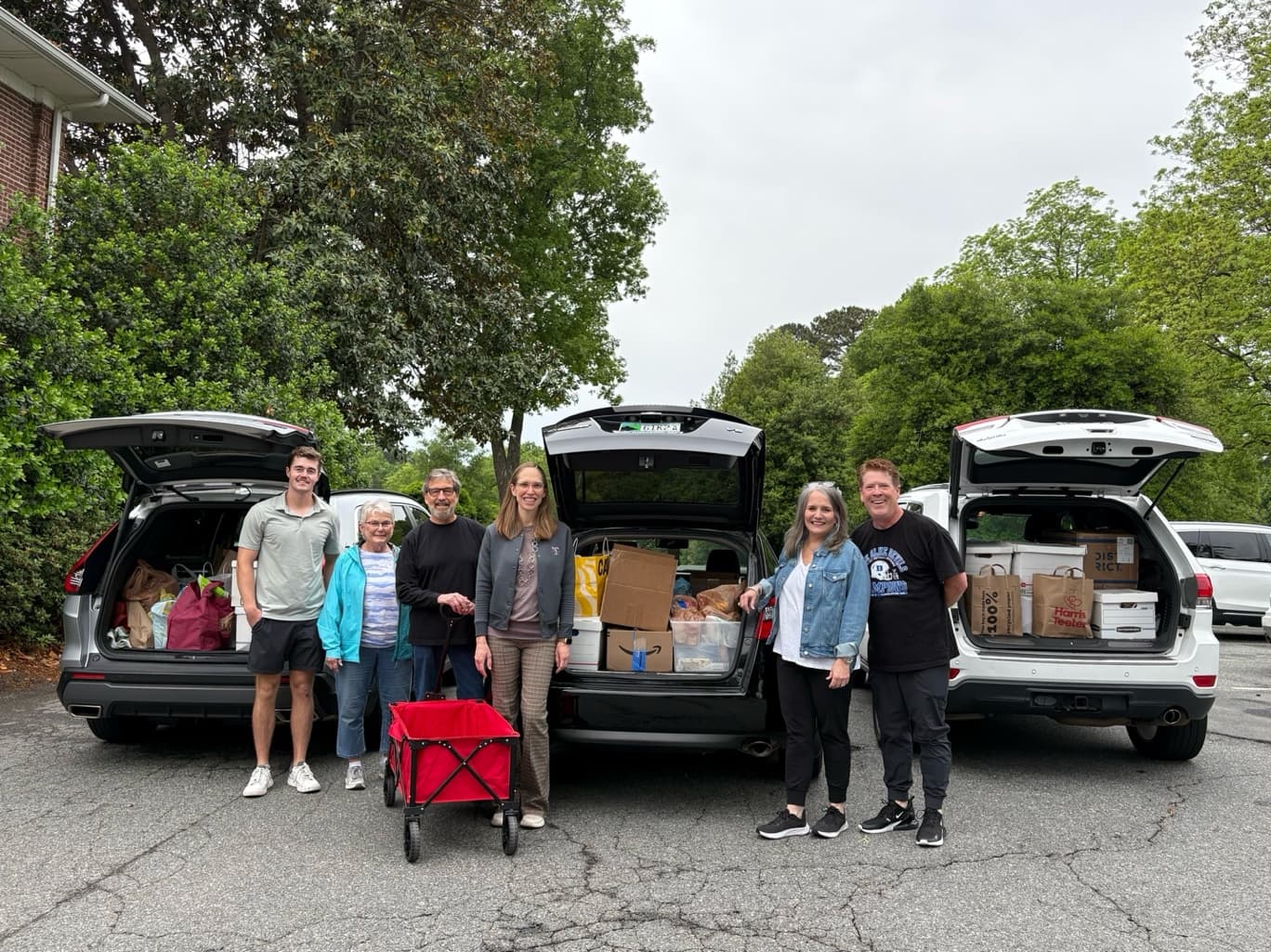 Elon lifelong learning group donates food, cash to Alamance pantry