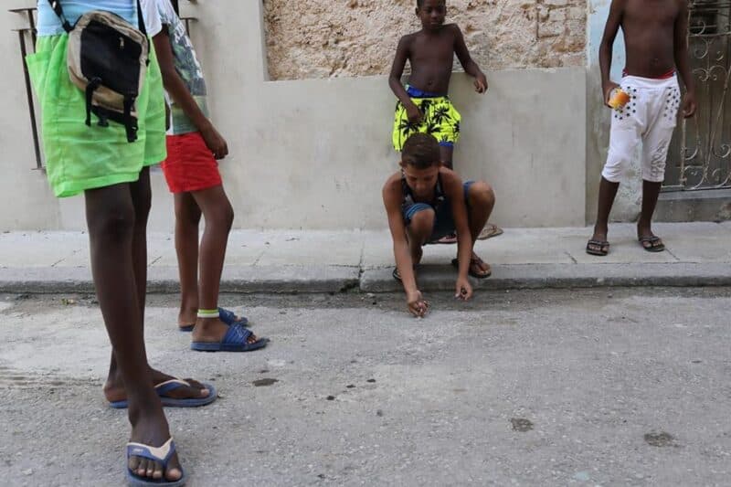 Havana's street children shift neighborhoods as Cuba's crisis deepens