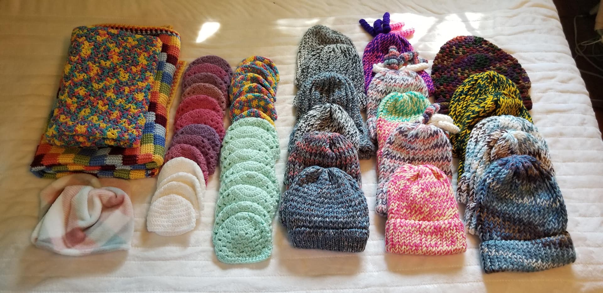 Goshen High's Blanket Nation Donates Hand-Knit Hats, Blankets to NICUs and Families