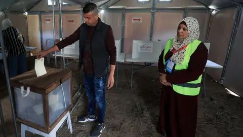 Palestinians hold rare local elections in West Bank and Gaza city