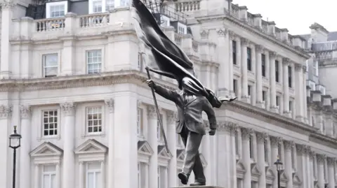 Signed Banksy-like sculpture appears in central London, stirs speculation