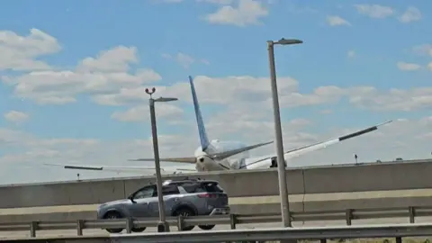 United Boeing 767 Strikes Turnpike Light Pole, Truck Near Newark Landing