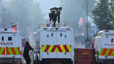 Homes set on fire after knife attack, police warn of escalating violence