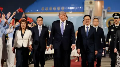 Trump arrives in Beijing for high-stakes talks with Xi Jinping