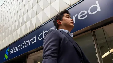 Standard Chartered plans to cut 7,000 jobs as AI reshapes roles
