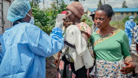 WHO chief visits Congo as deadly Ebola outbreak spreads to Uganda