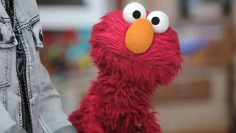 Elmo sparks Knicks backlash after cheering both teams before Finals