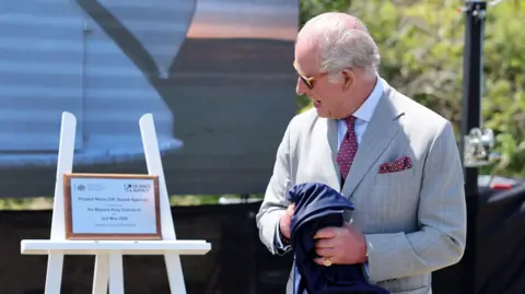 King ends historic Bermuda visit with space debris telescope launch