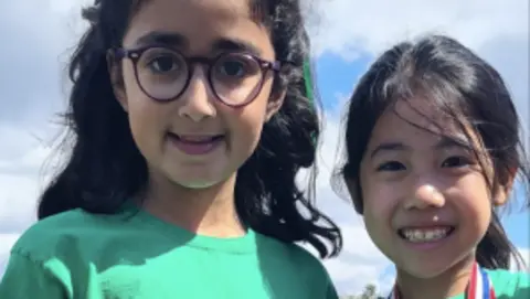Driver charged after school crash killed two girls in Wimbledon