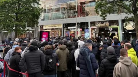 Crowds queue for £335 Audemars Piguet x Swatch Royal Pop watches