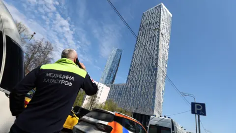 Ukrainian Drone Hits Moscow Tower as Kremlin Scales Back Victory Day Parade