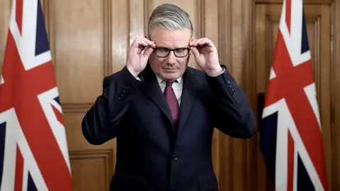 Starmer fights to stay in No 10 after Labour election rout sparks revolt