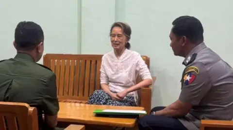Myanmar to move Aung San Suu Kyi to house arrest after sentence cut