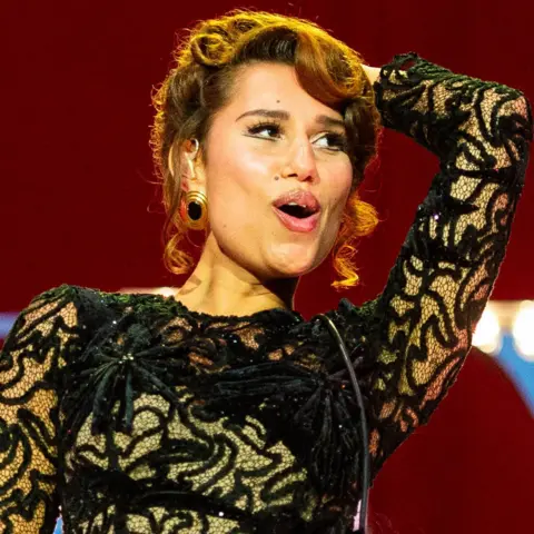 RAYE's Sophomore Album This Music May Contain Hope Arrives March 27