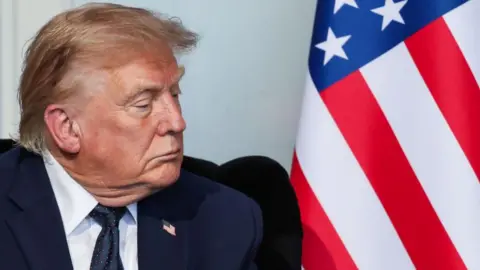 Trump says Strait of Hormuz will reopen Friday, deal details remain unclear