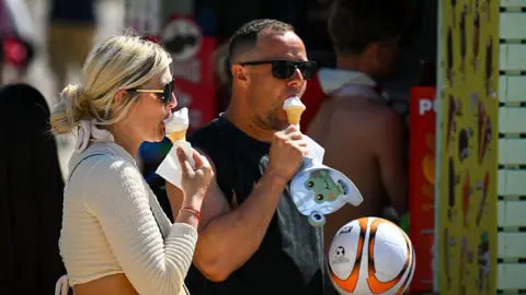 UK records hottest May day ever as heatwave grips London and south-east England