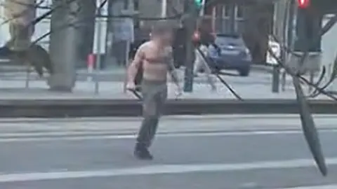 Four hospitalized after bare-chested man roams Edinburgh with weapon
