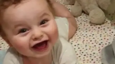 Trial hears teacher accused of murdering adopted baby after abuse claims
