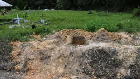 Police probe 56 bodies found at Trinidad cemetery, including 50 infants