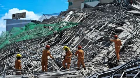 24 rescued after under-construction building collapses near Manila
