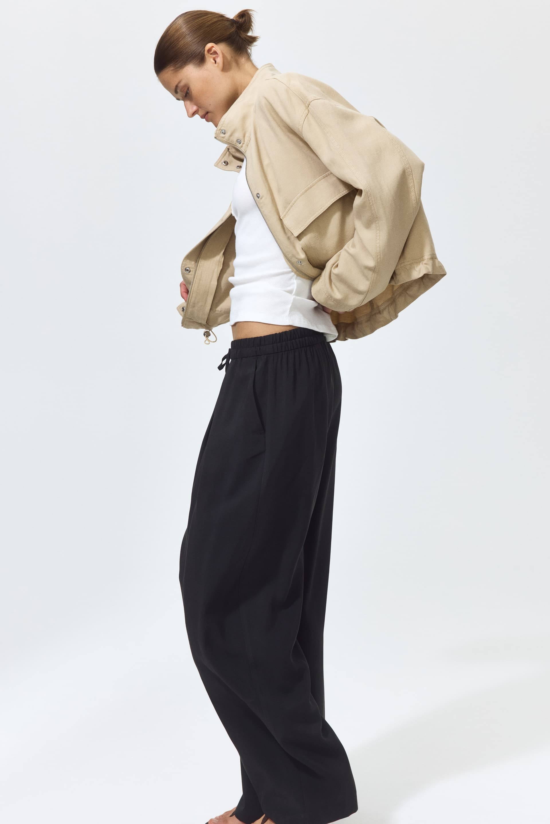 H&M backs utility details, barrel-leg silhouettes for spring 2026
