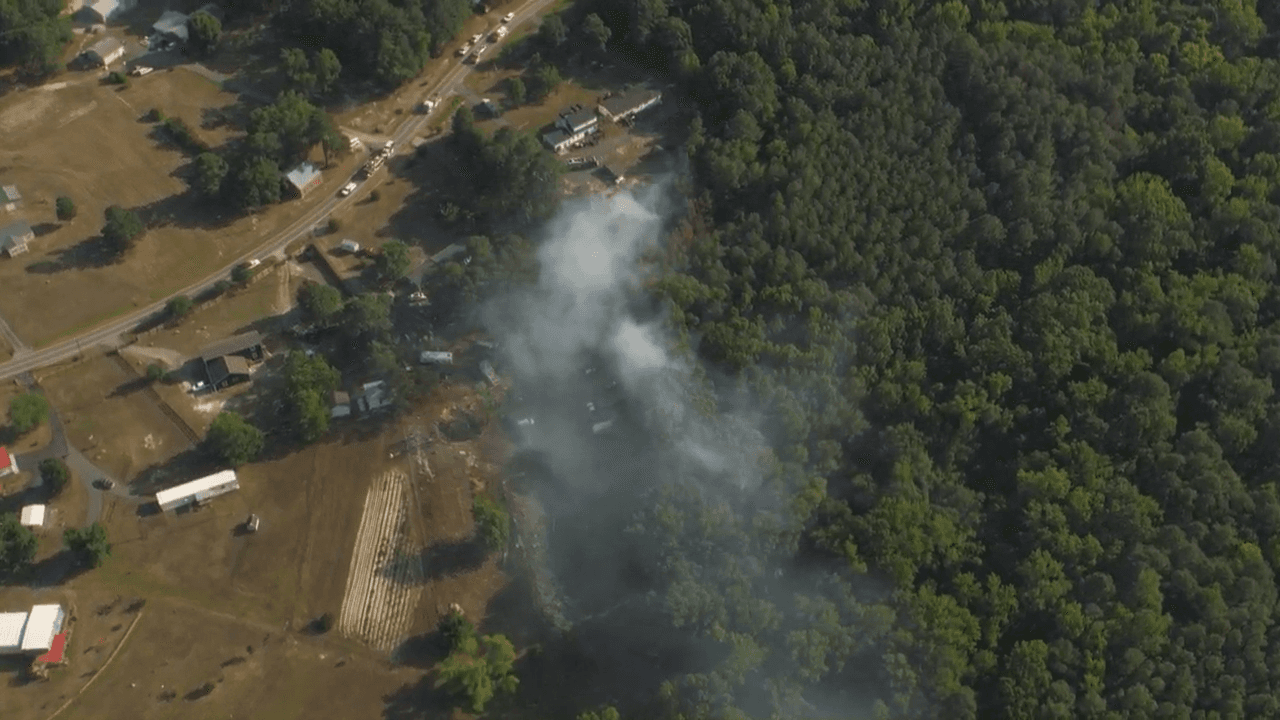 Fire crews investigate large outdoor blaze near Falls Lake in Wake County