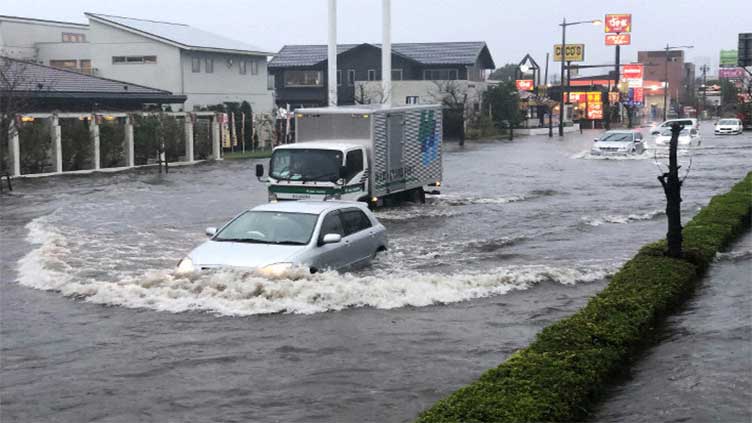 Japan braces for torrential rain, transport chaos as storms approach