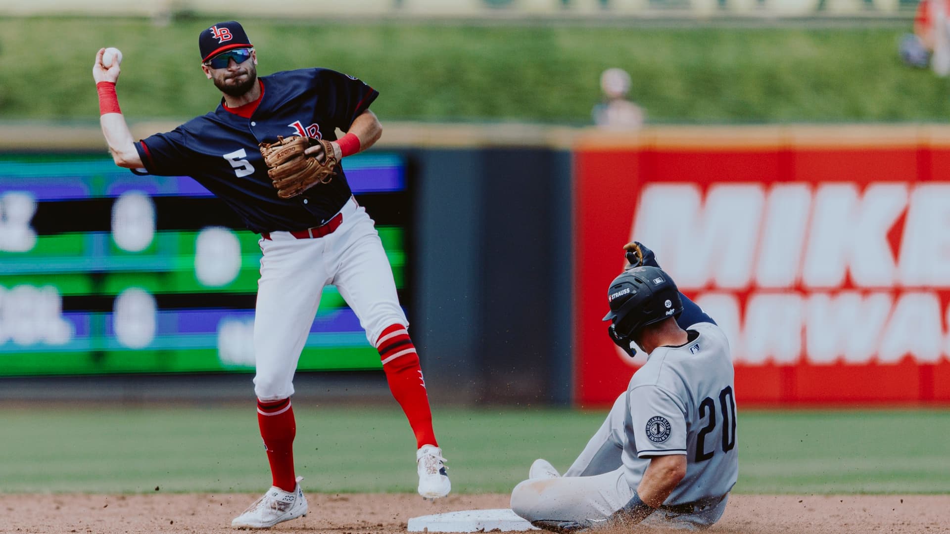 Louisville falls twice in Columbus after rain-delayed game resumes