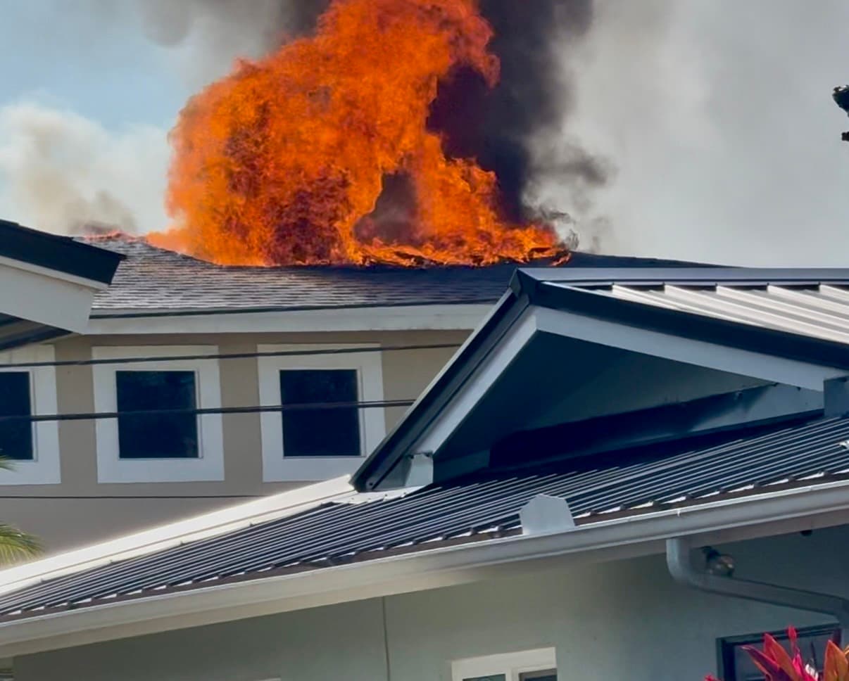 Largo house fire displaces three after garage blaze reaches roof