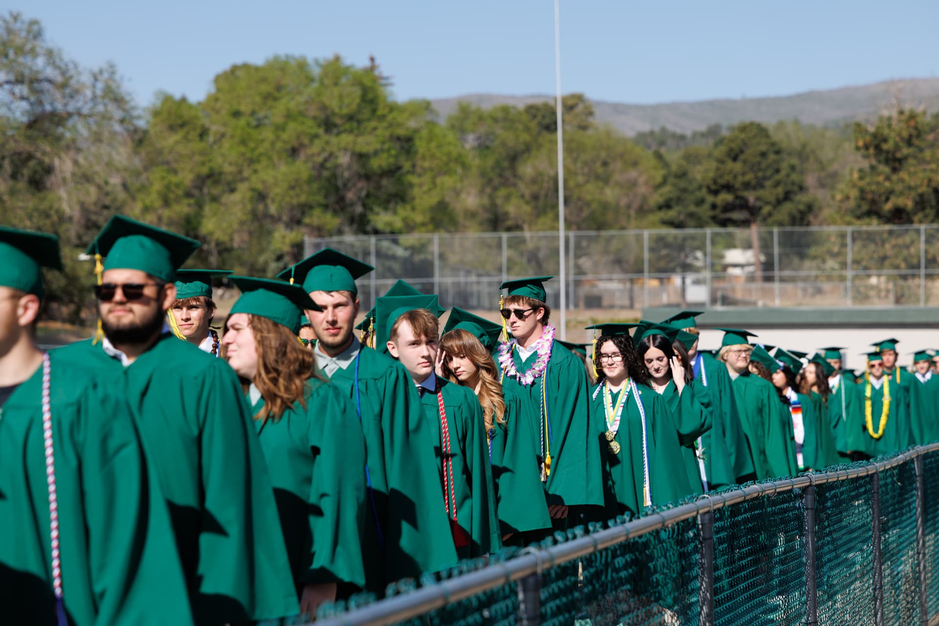Los Alamos High School Class of 2026 graduates at Sullivan Field