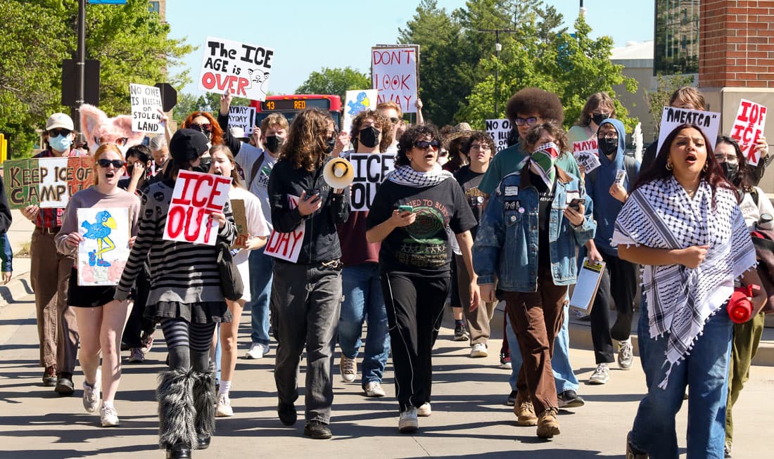 KU students join May Day protest, skipping classes in Lawrence