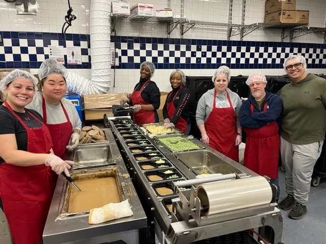 Baltimore Volunteers Deliver Meals, Gifts, Warm Clothing on Christmas Day
