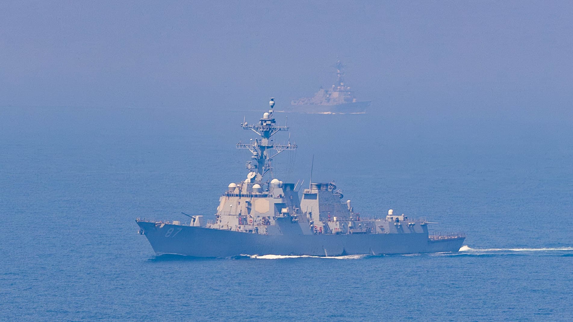 U.S. strikes Iranian sites as drones threaten ships in Strait of Hormuz