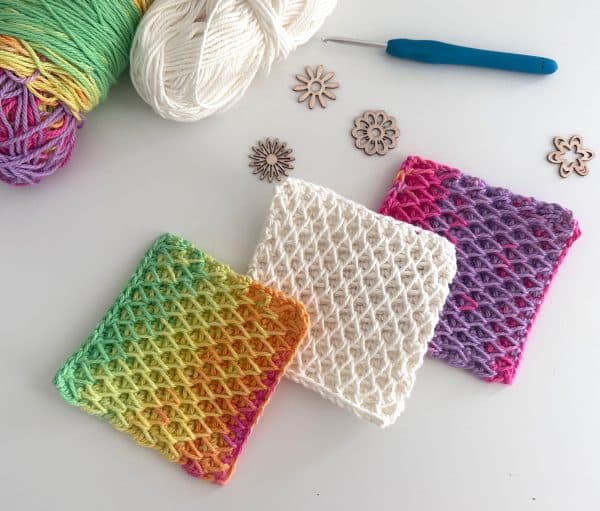 Honeycomb crochet coasters turn leftover yarn into textured home decor